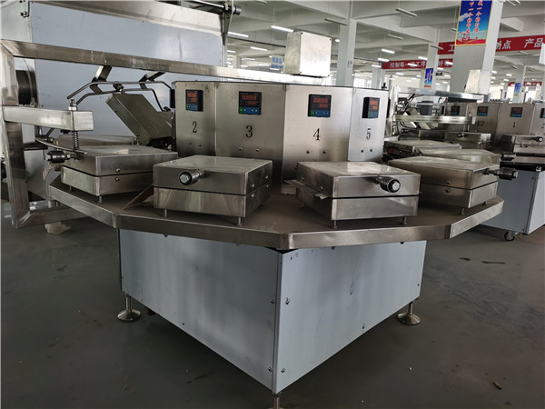 食品油炸機(jī)廠家簡述怎樣控制油炸機(jī)的油溫和火候